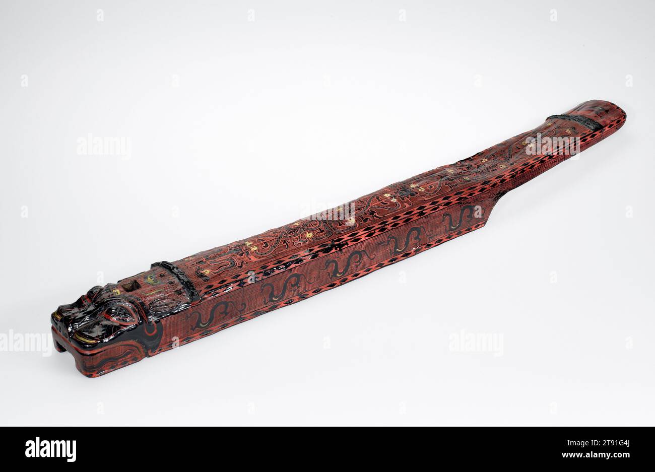 Zither (Qin), 5th century BCE, 2 3/4 x 3 5/16 x 34 1/4 in. (6.99 x 8.41 x 87 cm), Lacquer over wood core, China, 5th century BCE, Remarkable for its state of preservation and vivid colors, this rare five-stringed instrument called qin is constructed from a single piece of wood with a rectangular hole cut in the underside serving as a sound box. The important discovery of the tomb of Marquis I of Cheng (433 BCE), which yielded the massive set of sixty-five bronze bells also included two types of lacquer zithers: one version with ten strings resembled the rectangular type held by the tomb Stock Photo