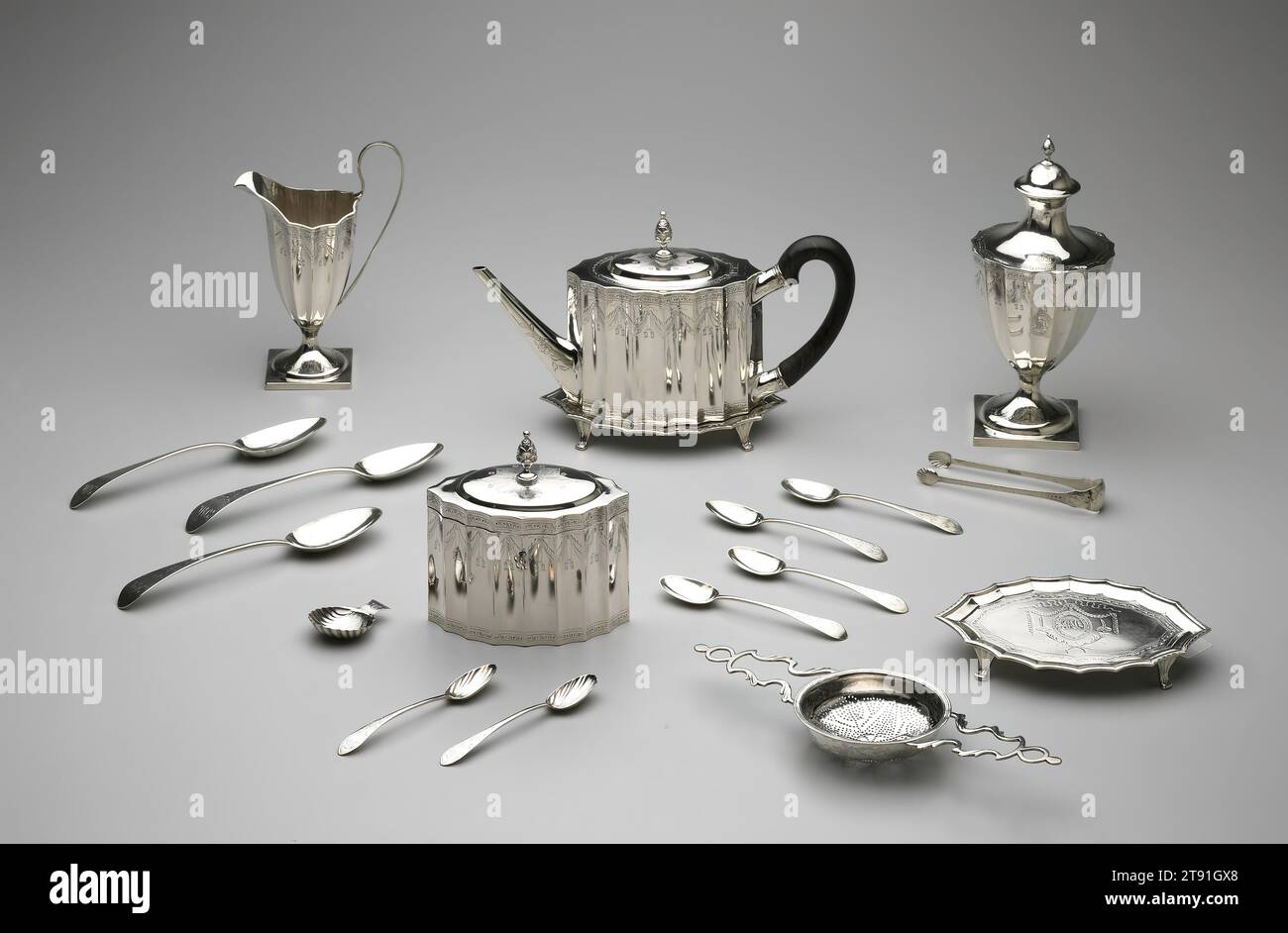 https://c8.alamy.com/comp/2T91GX8/sugar-tongs-from-a-tea-service-1797-paul-revere-jr-american-17341818-5-12-in-1397-cm-silver-and-wood-united-states-federal-the-most-complete-revere-service-known-this-set-was-made-for-a-boston-merchant-and-his-wife-john-and-mehitable-templeman-it-includes-one-of-only-two-tea-caddies-made-by-revere-the-locked-boxes-held-loose-tea-an-expensive-and-fashionable-commodity-the-shell-shaped-spoon-was-used-for-measuring-tea-and-the-sieve-was-used-for-straining-punch-a-beverage-often-served-along-with-tea-the-second-stand-may-have-been-used-as-a-tray-for-spoons-2T91GX8.jpg