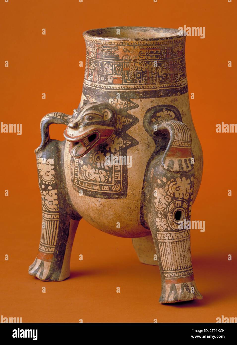 Vessel, c. 1100 - 1200 CE, 14 1/2 x 10 1/4 in. (36.83 x 26.04 cm), Clay, pigments, Costa Rica, 12th-13th century, Jaguar effigy jars are a classic form of ancient Costa Rican art. Shaped into the representation of a sun-devouring feline god, the vessel is covered with colorful painted designs that refer not only to the jaguar, but also to celestial elements such as the sun and stars. The legs of these jars were usually hollow, with clay balls inserted to make them rattle Stock Photo