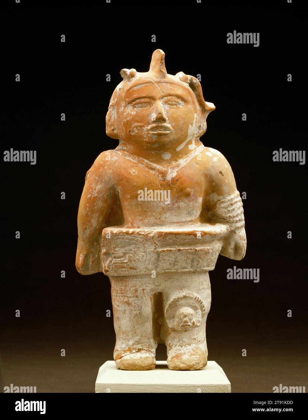 Figure, c. 600-750 CE, 11 x 5 3/4 x 2 3/8 in. (27.94 x 14.61 x 6.03 cm), Clay, pigments, Mexico, 7th-8th century, Originating around 1500 B.C. among the Olmec, the Mesoamerican ballgame was the first team sport in human history. While there were localized variations in the game that was played from New Mexico to Honduras to the Caribbean, there were also many consistent features. Players' hands were only used to put the ball into play, after which it was deflected with the hips, knees, elbows, feet, and head. Stock Photo