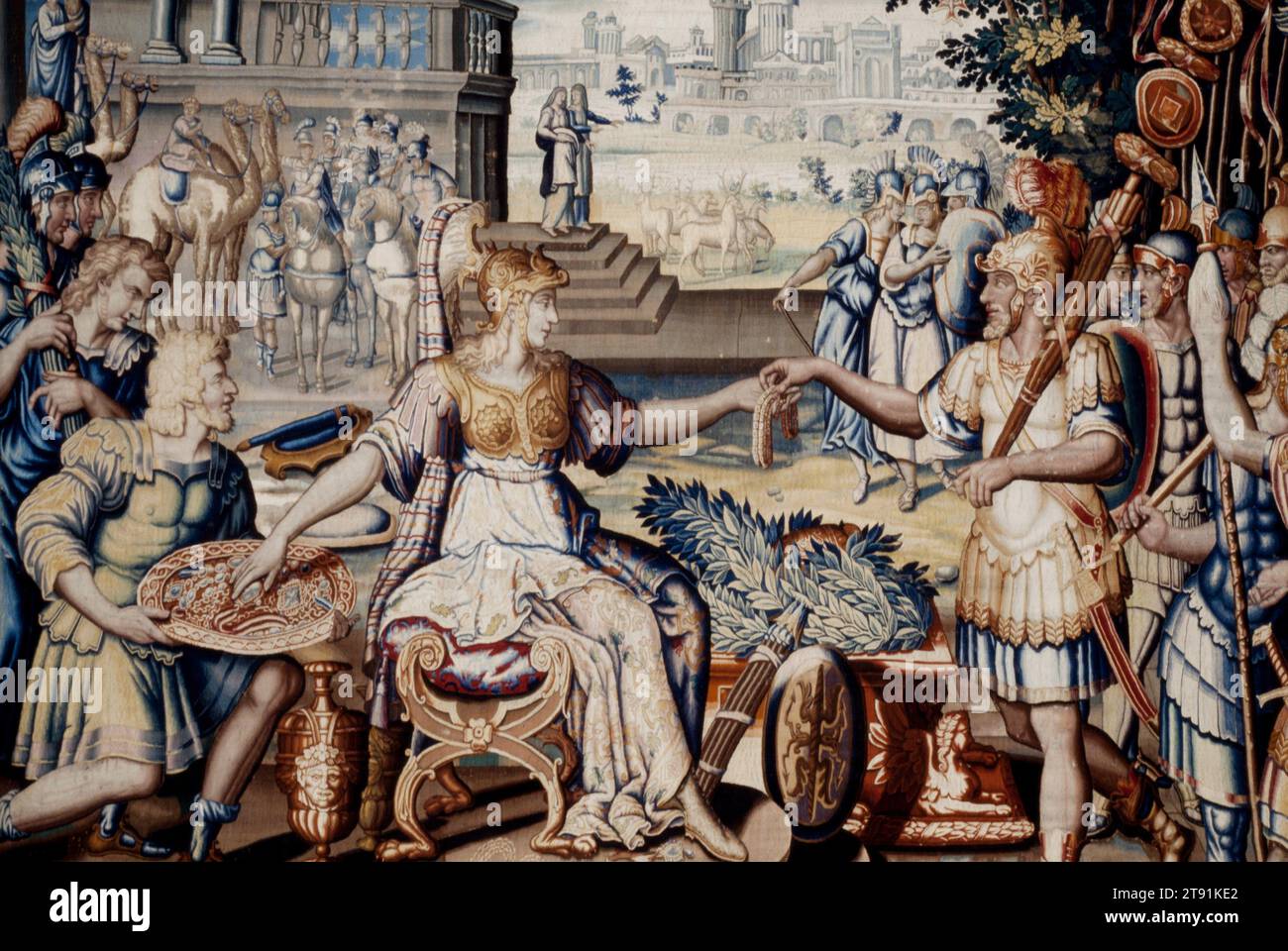 The Queen Distributing the Booty, designed 1562–1565 (woven 1611–1627), attributed to Workshop of Lucas Wandandalle at the Faubourg Saint-Marcel manufactory of Marc de Comans and François de la Planche; Delineator: Central design by Antoine Caron; Designer: Border design by Guillaume Dumée; Designer: Border design by Lauren Goyot; Cartoonist: Central cartoon by a painter active in France; Designer: Border design and cartoon by Guillaume Dumée and Laurent Guyot, French, 1521–1599, H.161-3/8 x W.234-7/8 in. (irregular), Wool, silk; tapestry weave, France, 16th-17th century Stock Photo