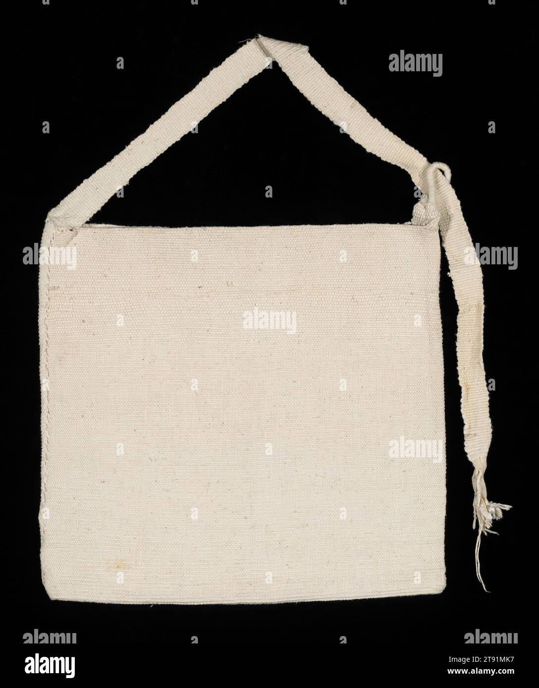 Man's bag, 20th century, 14 3/4 x 13 3/4 in. (37.5 x 34.93 cm)32 x 1 in. (81.28 x 2.54 cm) (object part, strap), Cotton; knitting, weaving, Guatemala, 20th century, Men in Chichicastenango no longer wear traje as everyday clothing, but their ceremonial traje is among the most spectacular in the Guatemala highlands. Loosely patterned after a Spanish matador's costume, the heavy woolen jacket and pants are opulently embroidered in silk or sedalina (synthetic silk) floss. One large red tzute is carefully arranged as a head covering, while additional tzutes may be worn over the shoulders Stock Photo