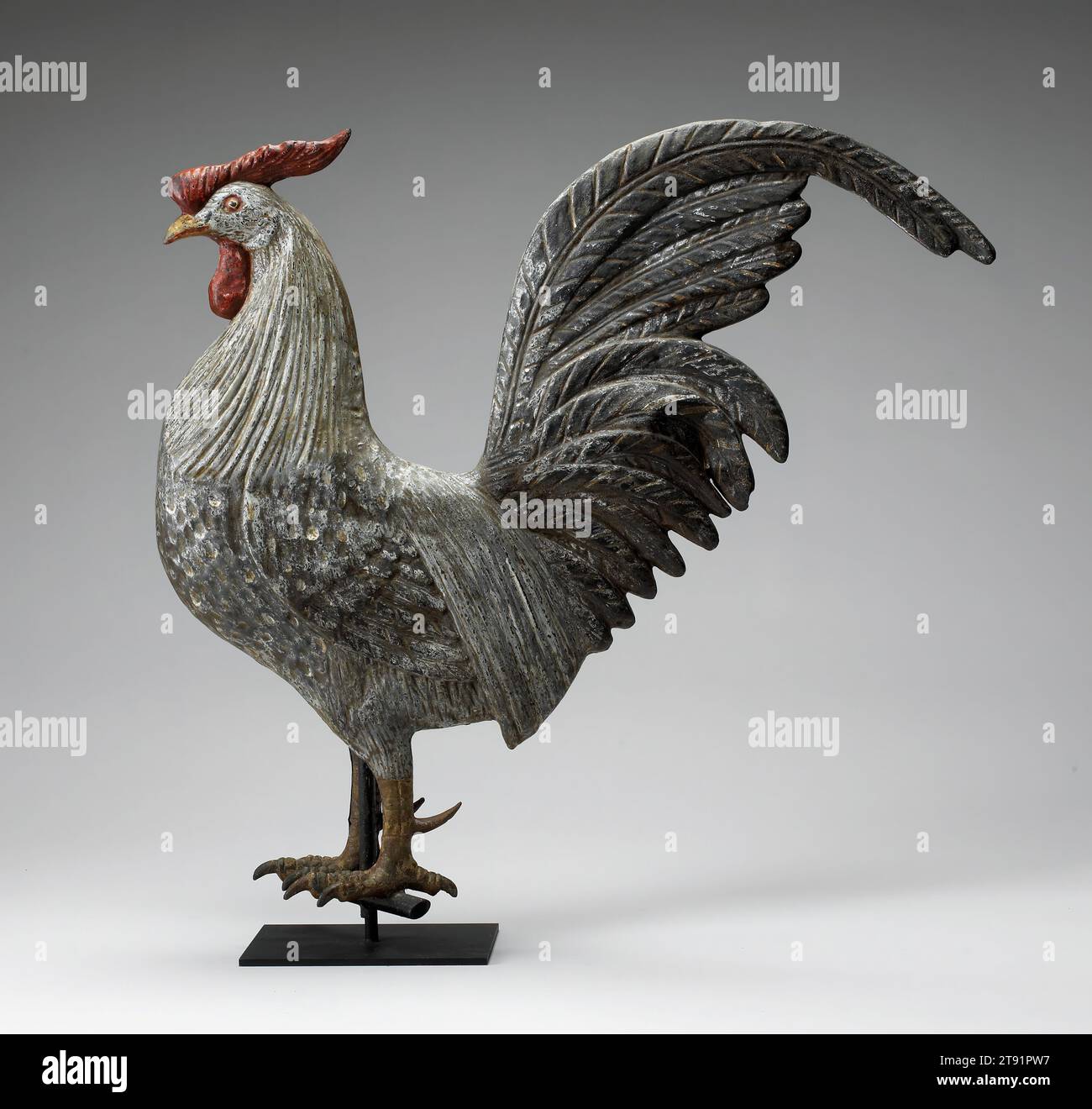 Hamburg Rooster weathervane, c. 1880, L.W. Cushing & Sons, American, Waltham, Massachusetts, 1872–1933, 27 1/2 x 27 3/4 x 4 7/16 in. (69.85 x 70.49 x 11.27 cm), Copper, pigment, United States, 19th century, Nineteenth century American farmers developed an astonishing variety of poultry crossbreeds - highly specific kinds of birds raised for meat, eggs, or even appearance. Weathervane makers catered to this popularity by developing breed specific vanes such as this Hamburg Rooster. This rooster's magnificently swept back comb and tail would have given the illusion of a brisk wind Stock Photo