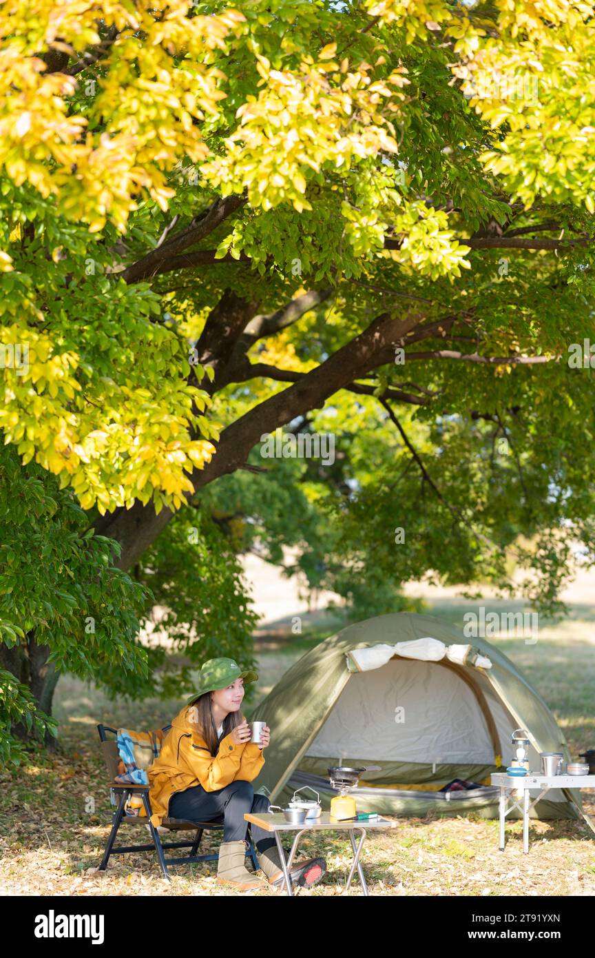 One woman camping sun tent hi-res stock photography and images - Alamy