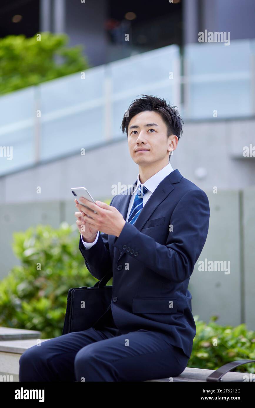young Japanese businessman Stock Photo - Alamy