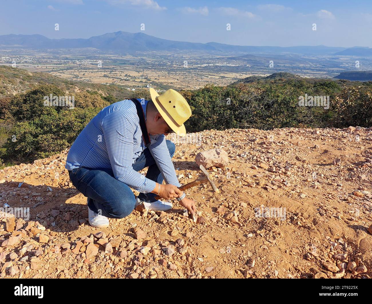 Dark-skinned Latino miner fights for the rights of mine workers who search for minerals to improve their employment situation Stock Photo