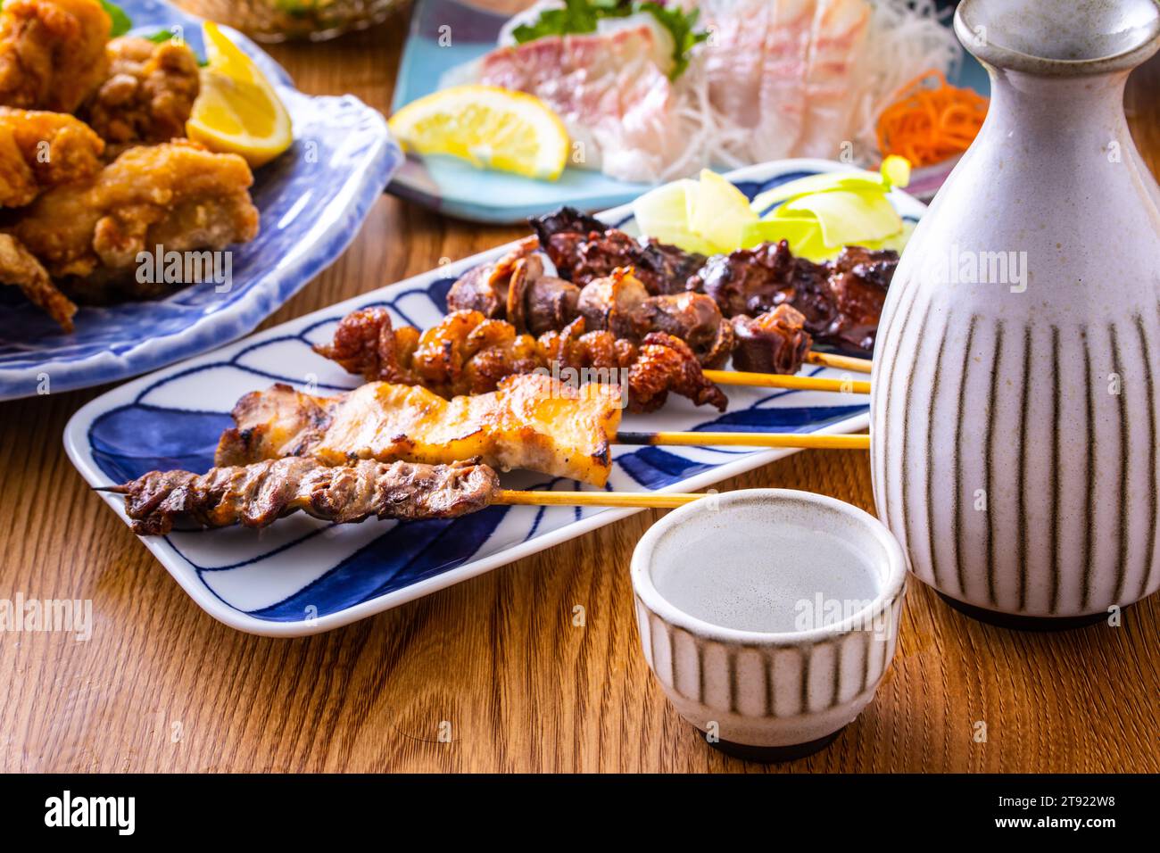 Japanese sake and food at a Japanese izakaya Stock Photo Alamy
