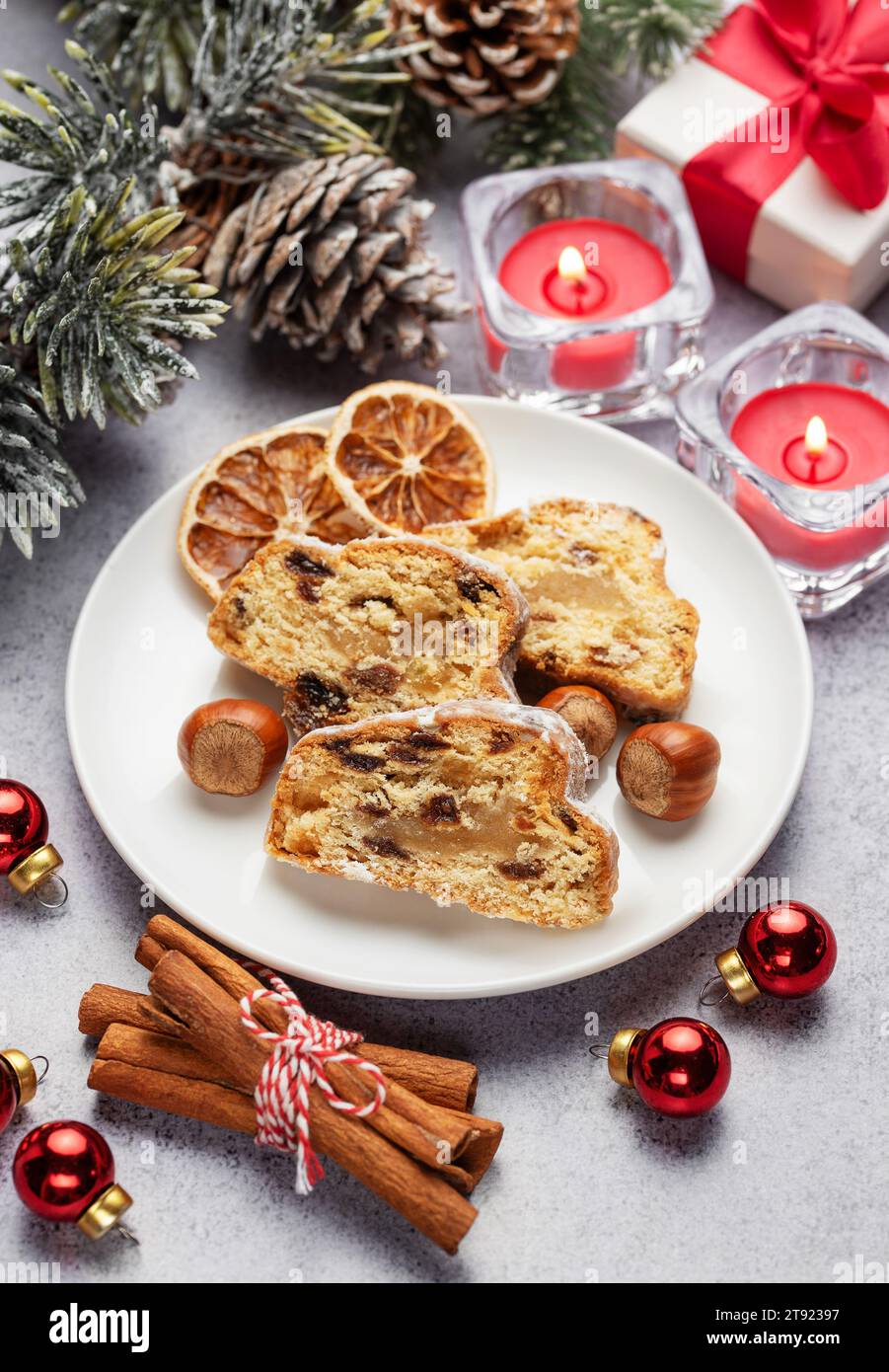 Traditional  stollen fruit cake. Christmas stollen with winter holidays decoration Stock Photo