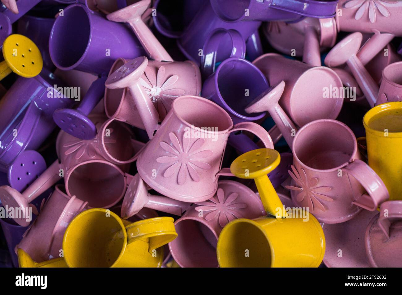 Set of colorful watering cans made of metal Stock Photo Alamy