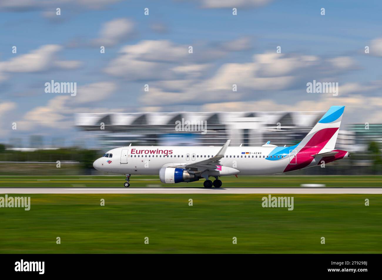 Munich, Germany - September 02. 2023 : Eurowings A320-214 with the aircraft registration D-AEWR is starting on the southern runway 26L of the Munich a Stock Photo