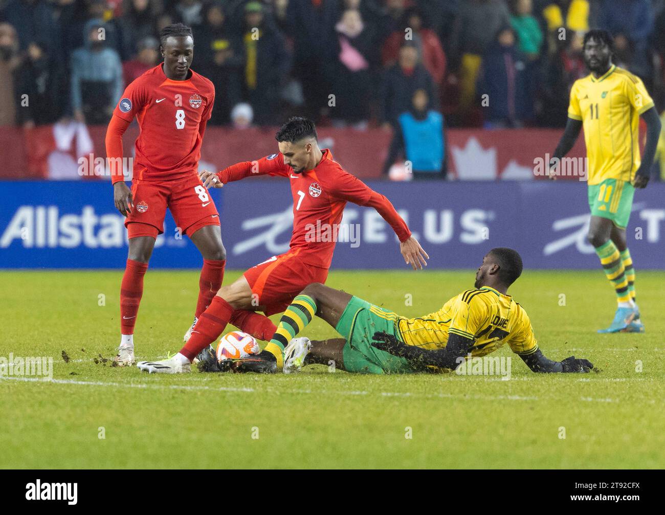 Toronto, Canada. 21st Nov, 2023. Stephen Eustaquio (2nd L) of Canada vies with Damion Lowe of Jamaica during the second leg match of the CONCACAF Nations League quarterfinals between Canada and Jamaica at BMO Field in Toronto, Canada, on Nov. 21, 2023. Credit: Zou Zheng/Xinhua/Alamy Live News Stock Photo