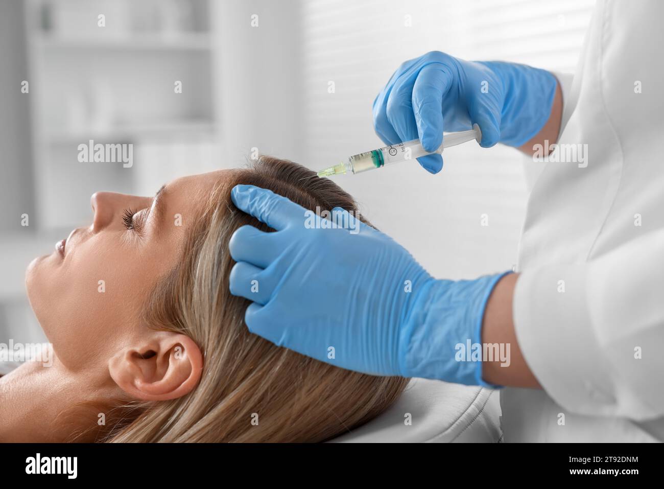 Doctor cosmetologist giving injection hi-res stock photography and ...