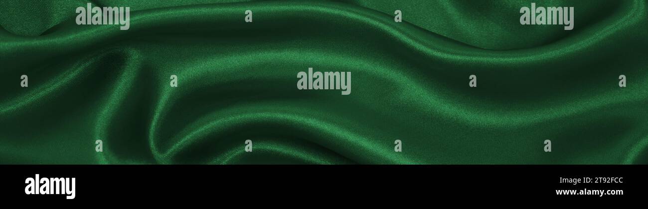 Smooth elegant green silk or satin luxury cloth texture can use as ...