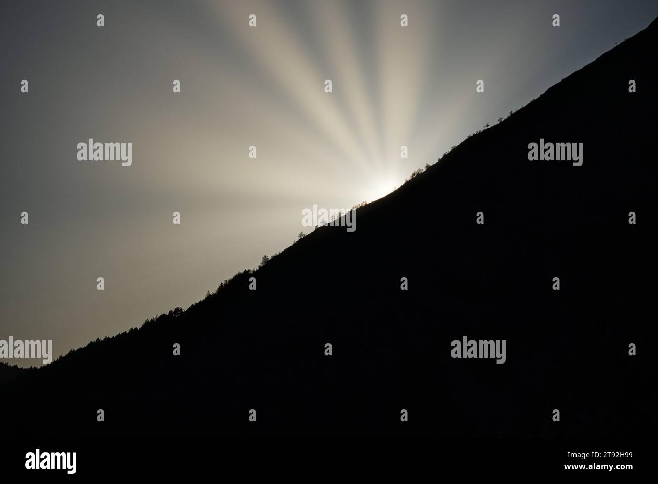 Sunrise on a mountain peak in Norway. The mountain in the shade. Landscape shot from Scandinavia Stock Photo