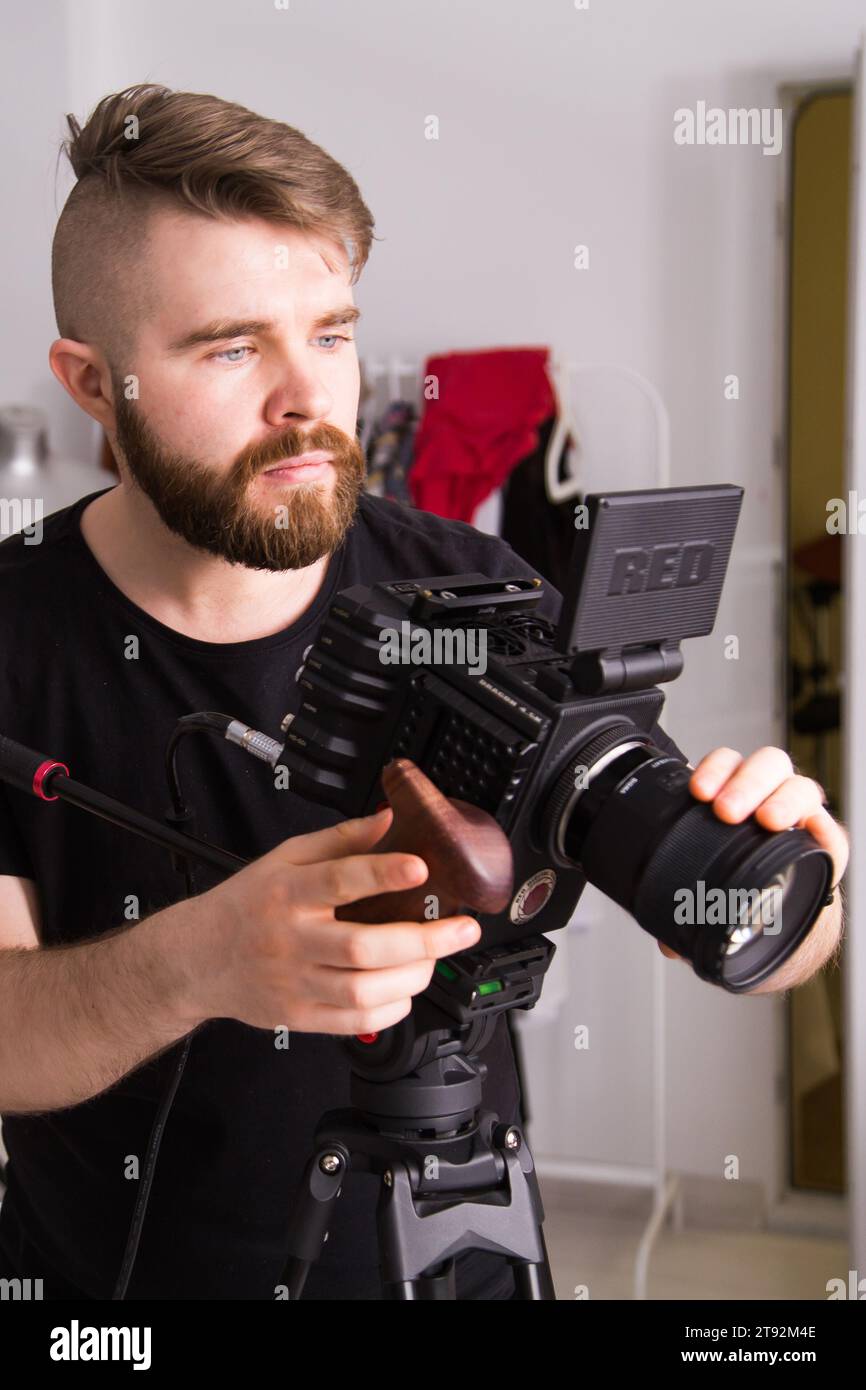 UFA, RUSSIA - 29 FEBRUARY 2020: cameraman works with Red digital cinema cameras. RED is the leading manufacturer of professional digital cinema Stock Photo