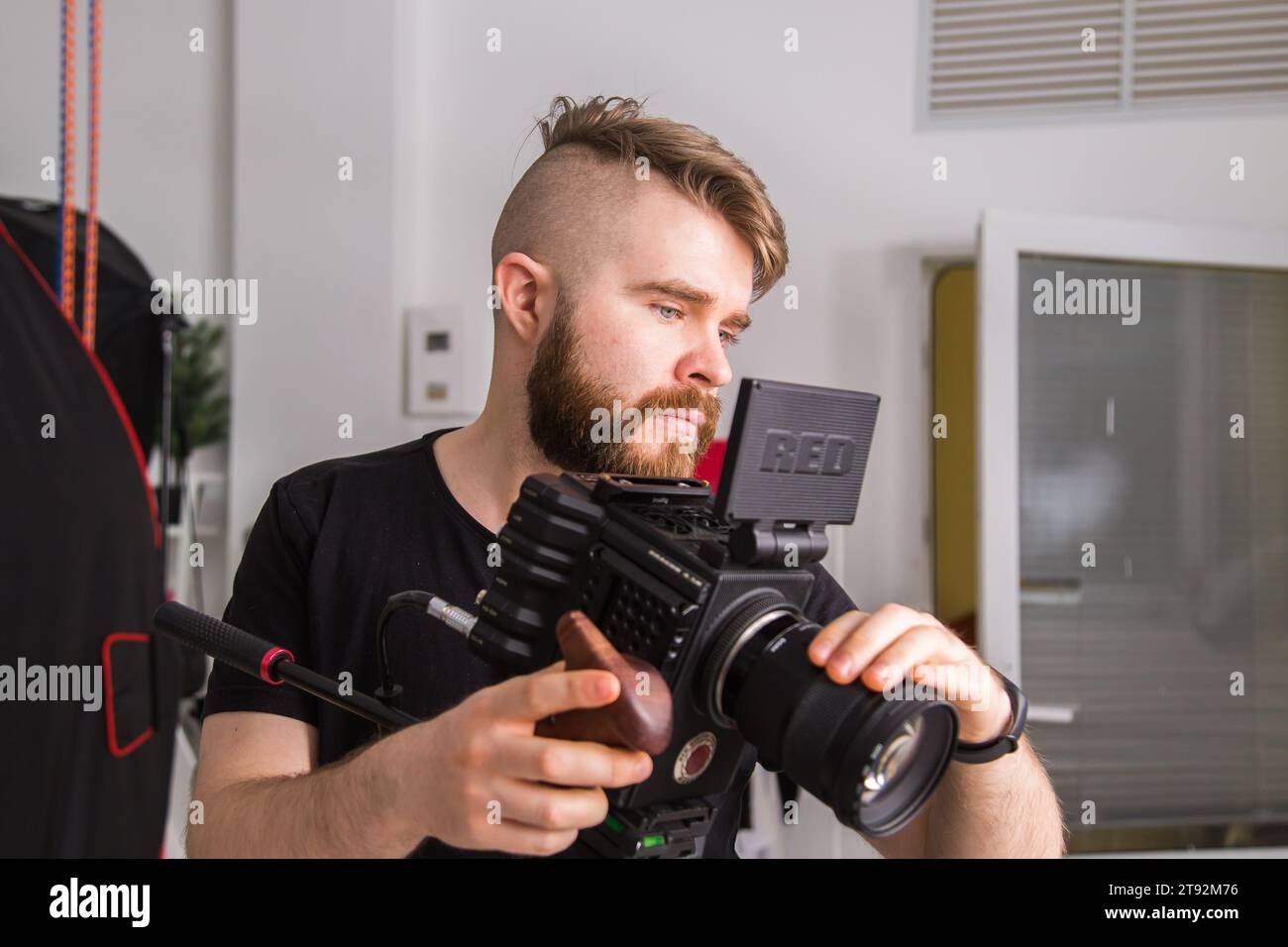 UFA, RUSSIA - 29 FEBRUARY 2020: cameraman works with Red digital cinema cameras. RED is the leading manufacturer of professional digital cinema Stock Photo