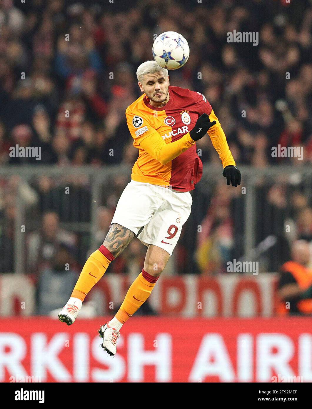 Galatasaray's Mauro Icardi, top, heads the ball with Manchester