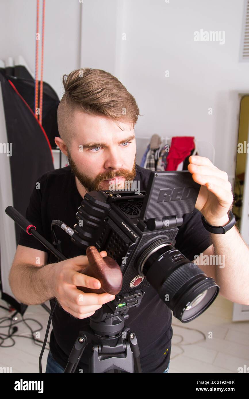 UFA, RUSSIA - 29 FEBRUARY 2020: cameraman works with Red digital cinema cameras. RED is the leading manufacturer of professional digital cinema Stock Photo
