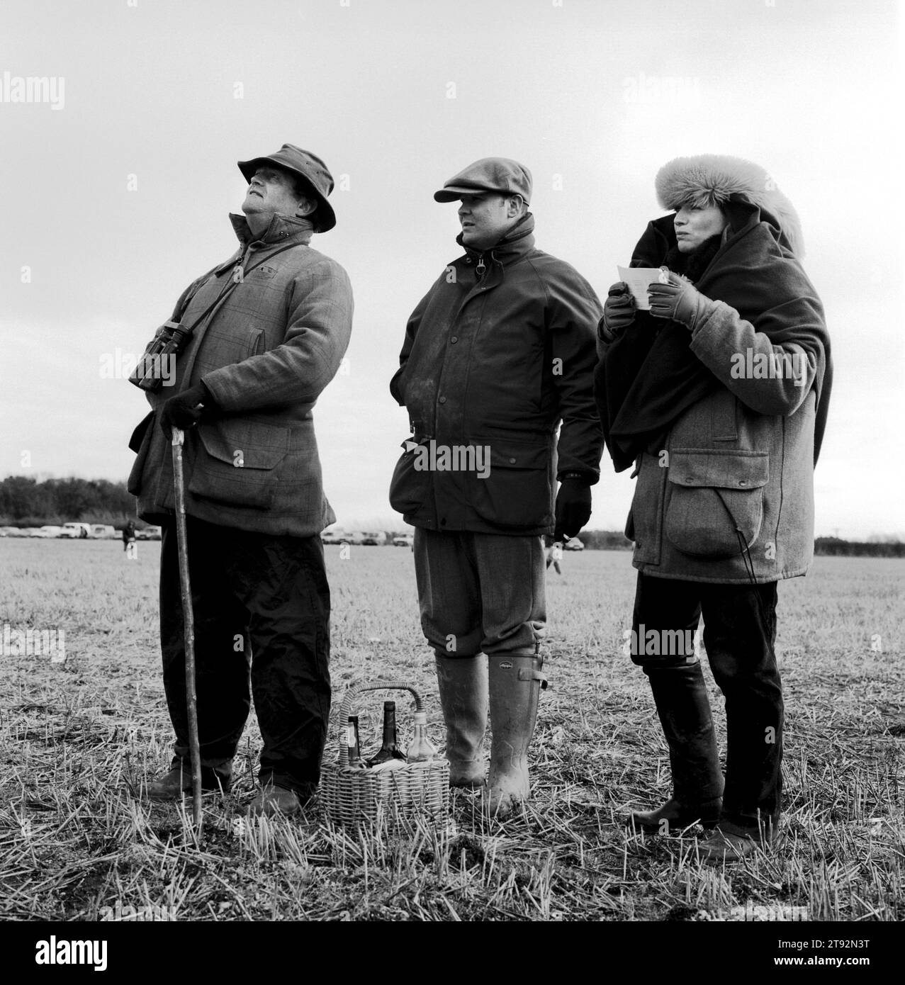 Hare Coursing 2000s UK , Spectators on a bitterly cold February day members of the Swaffham Coursing Club meet near Narborough, Norfolk. UK England 2002 2000s HOMER SYKES Stock Photo