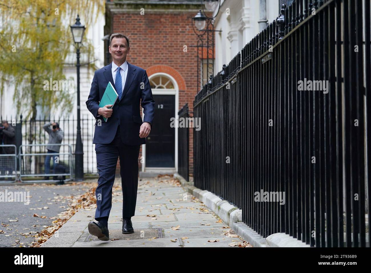 Britain's Chancellor of the Exchequer Jeremy Hunt walks to his car ...