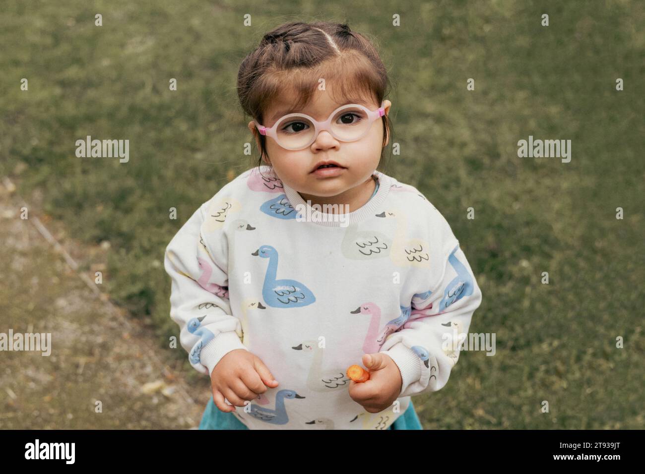 cute little girl in eyeglasses Stock Photo