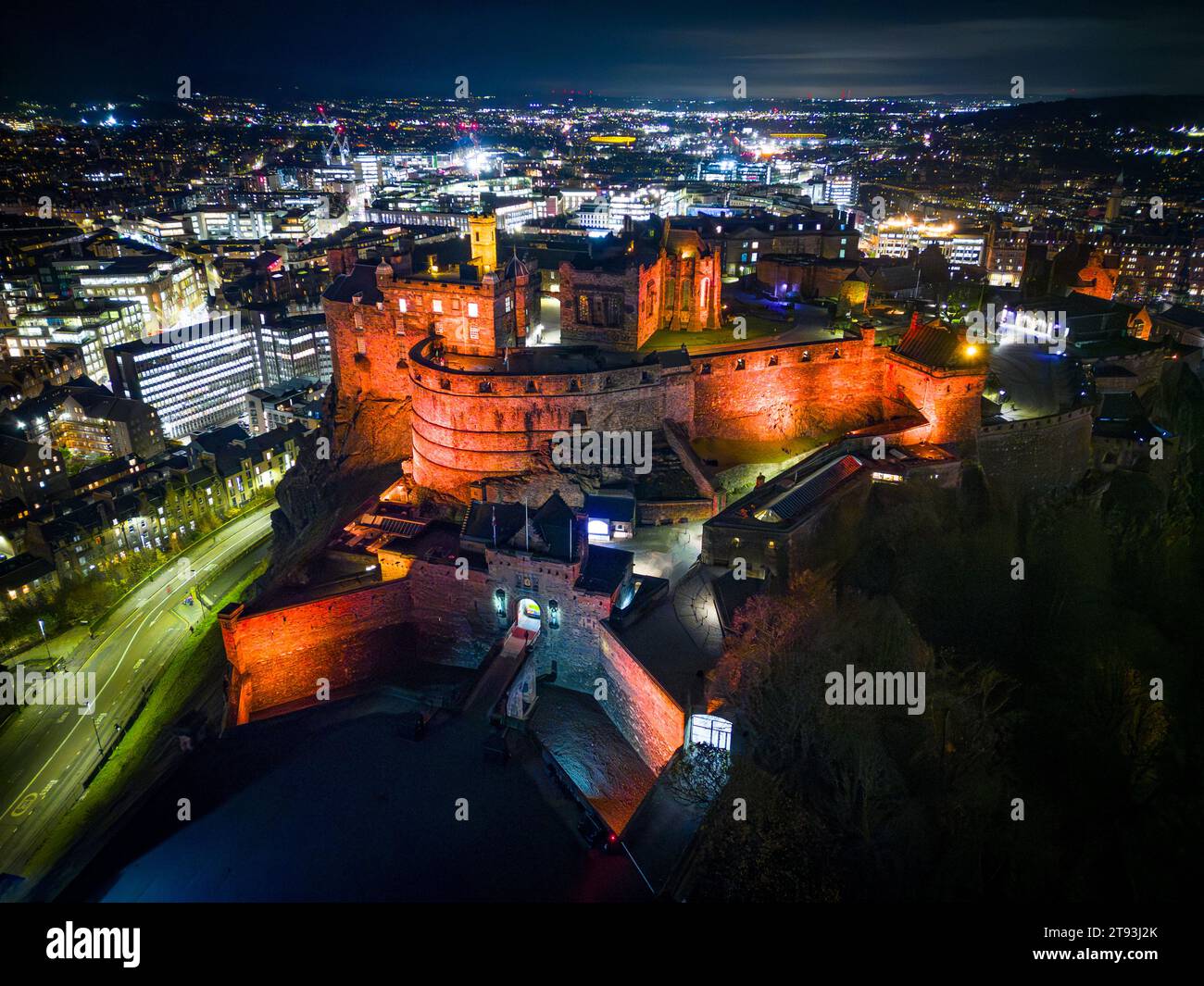 Aerial view at night of Edinburgh Castle illuminated in red, Edinburgh, Scotland UK Stock Photo