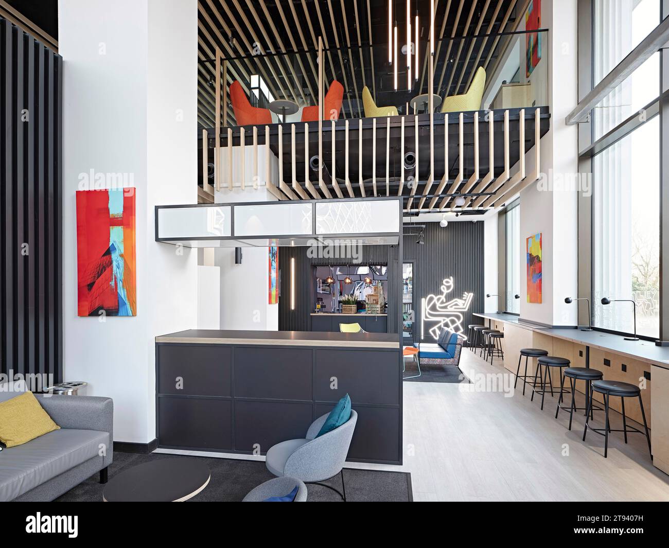 Informal workspace and lounge. Altus House, Leeds, United Kingdom. Architect: O'Connell East Architects, 2022. Stock Photo