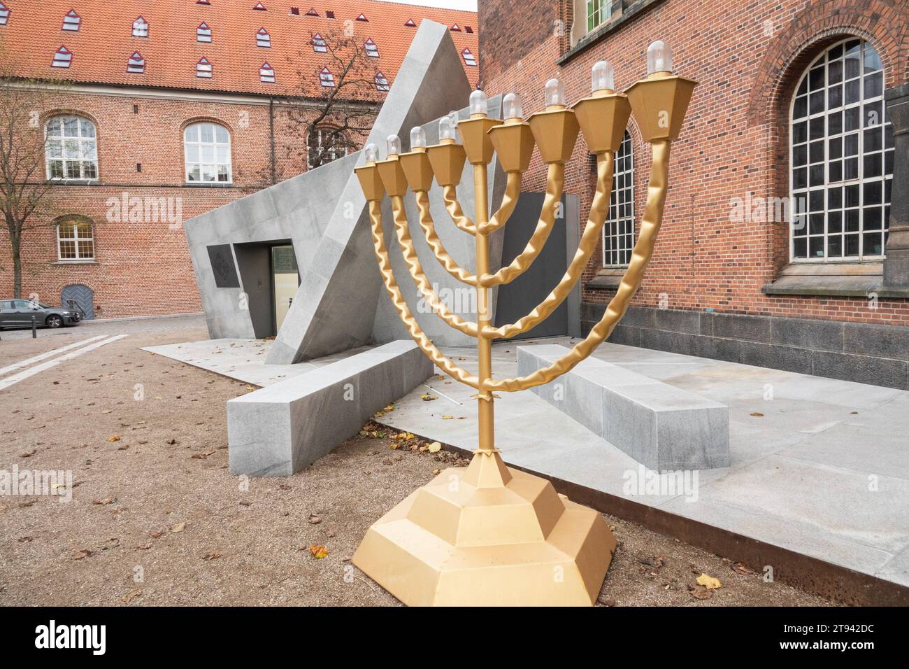 Temple Menorah by The Danish Jewish Museum entrance in Copenhagen as seen from the garden of the Danish Royal Library. Architect is Daniel Libeskind. Stock Photo