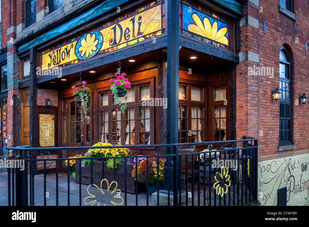 The popular Yellow Deli is one of many charming businesses along Main Street, Oneonta. Stock Photo