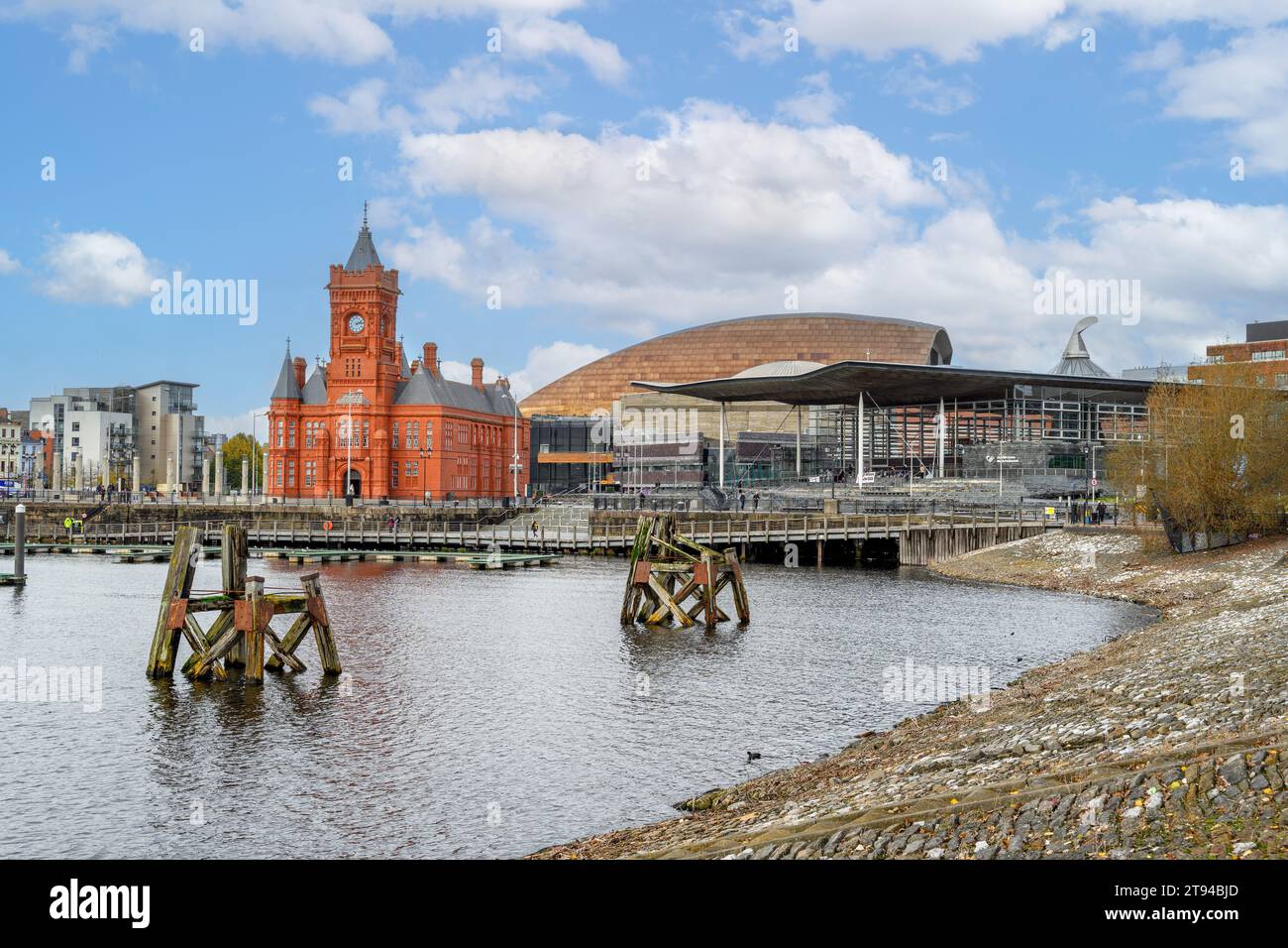 The historic Pierhead Building and the National Assembly for Wales building, Cardiff Bay, Cardiff, UK Stock Photo