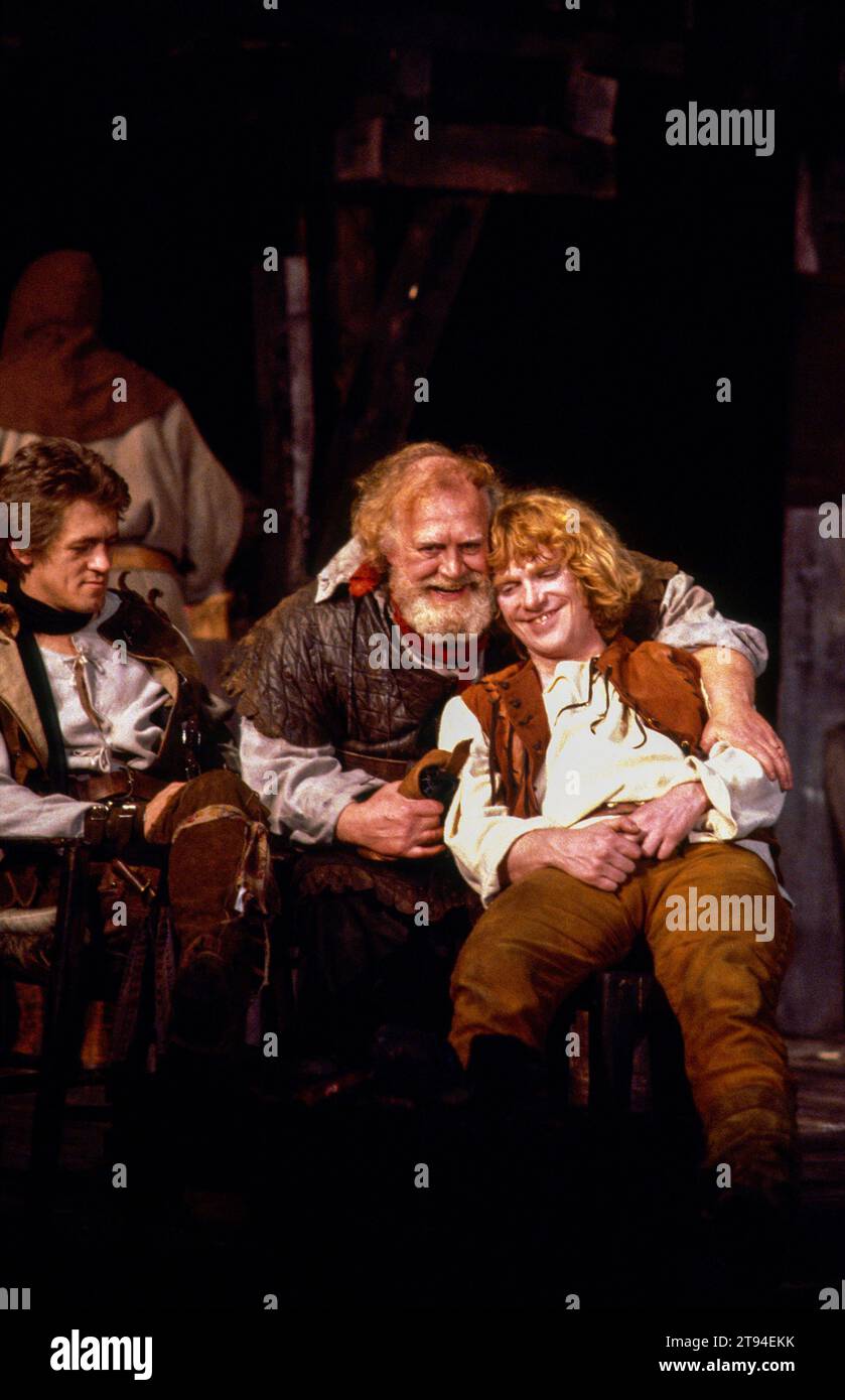 Eastcheap, the Boar's Head Tavern,  l-r: Miles Anderson (Ned Poins), Joss Ackland (Sir John Falstaff), Gerard Murphy (Prince Hal) in HENRY IV part 1 by Shakespeare at the Royal Shakespeare Company (RSC), Barbican Theatre, London EC2  07/05/1982  music: Guy Woolfenden  design: John Napier  lighting: David Hersey  fights: Malcolm Ranson  director: Trevor Nunn Stock Photo