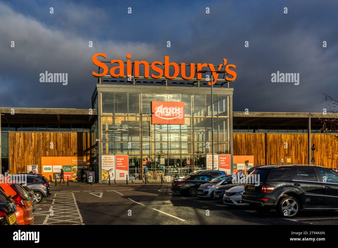 A sign for Sainsbury's and Argos on a large Sainsbury's supermarket in King's Lynn, Norfolk Stock Photo
