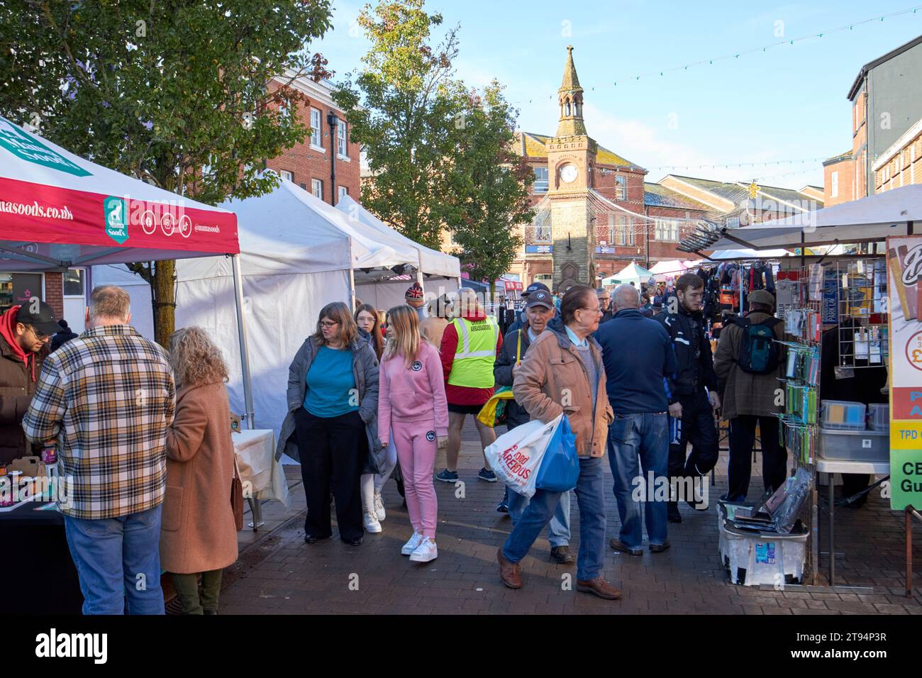 market stalls in winter on a saturday market day in the market town of ormskirk, lancashire, england, uk Stock Photo