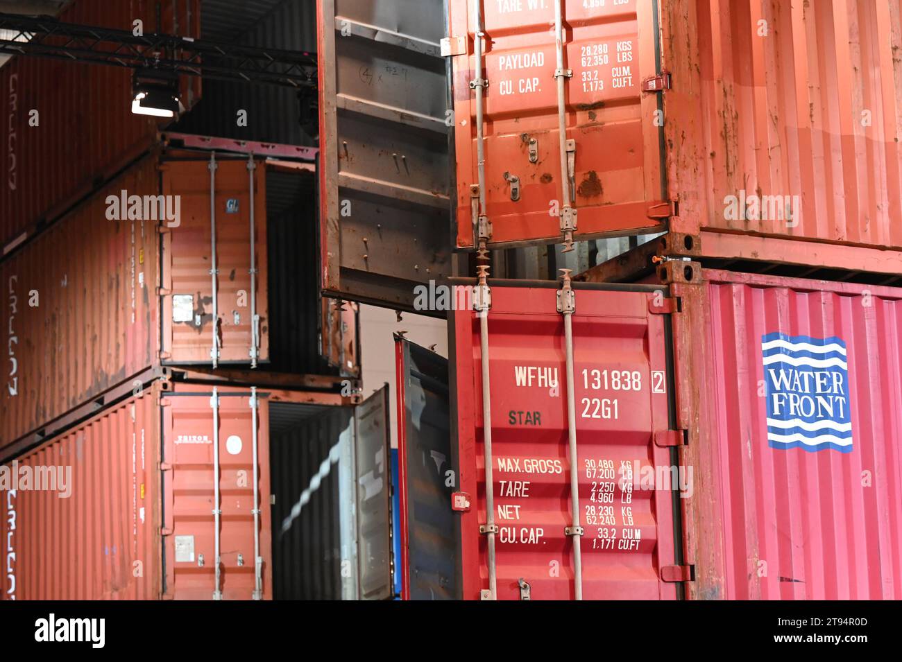 Freight containers stacked in a hall, Hamburg Stock Photo - Alamy