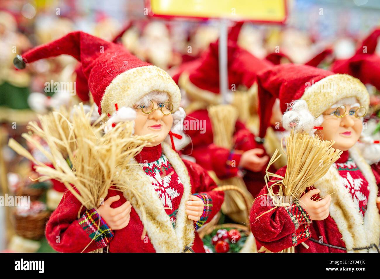 Christmas decorations put on the shelf in the toy store santa claus wife Stock Photo