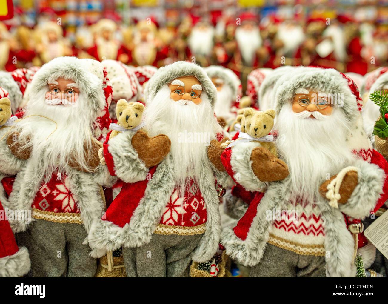 Christmas decorations put on the shelf in the toy store santa claus Stock Photo