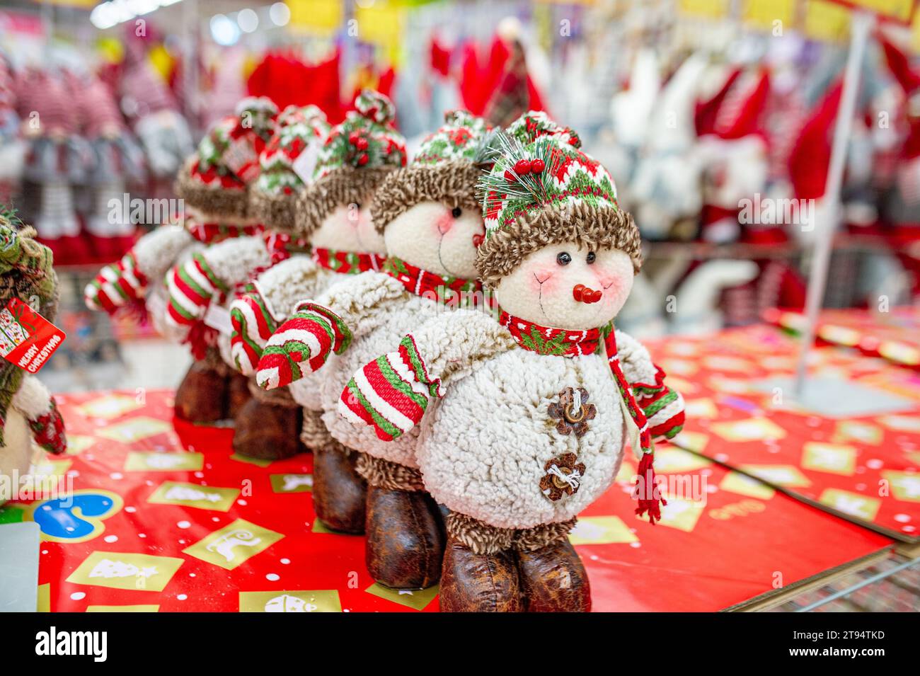 Christmas decorations toys displayed on the shelf snowman Stock Photo Alamy