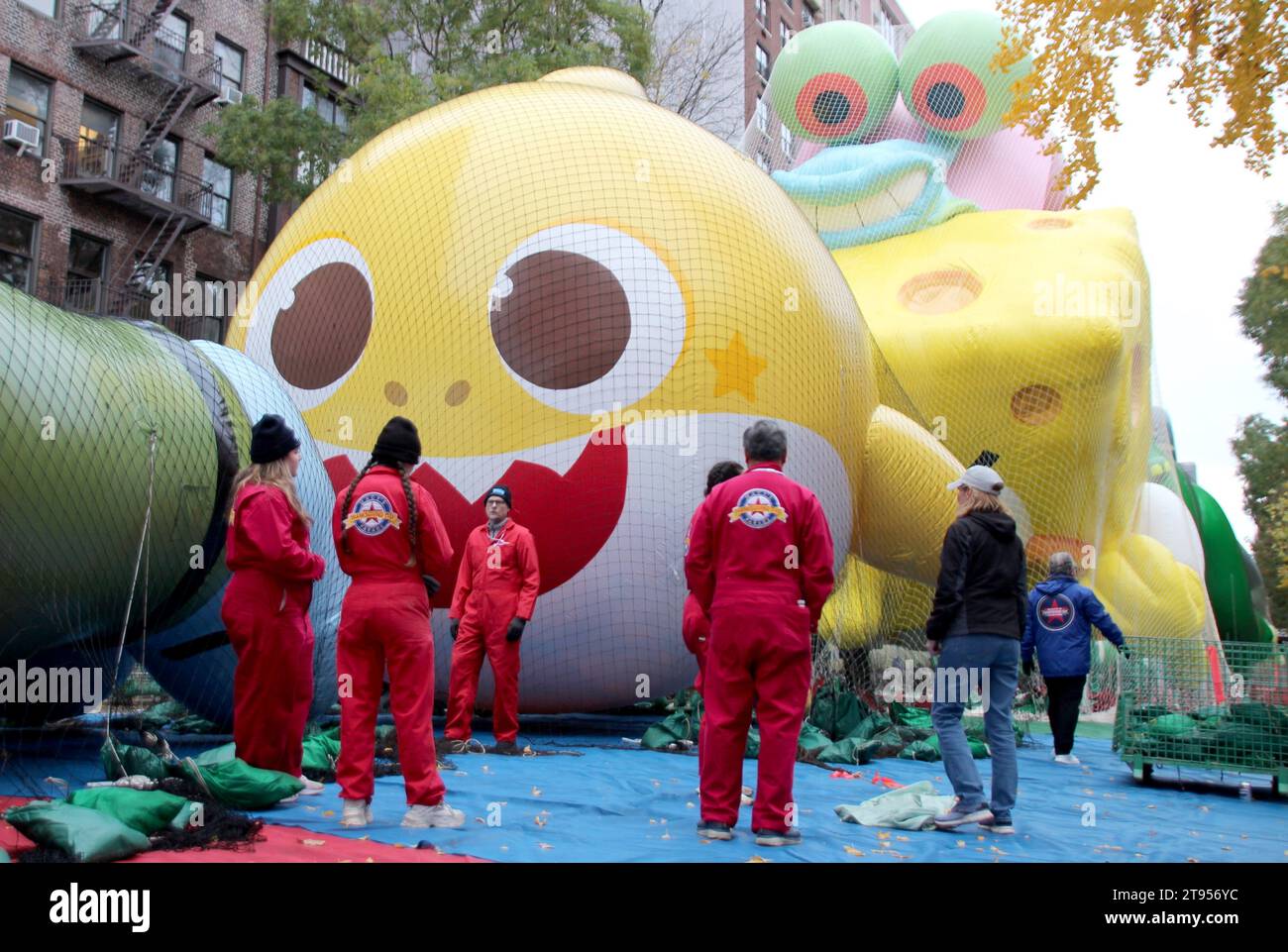 New York, USA. 22nd Nov, 2023. Giant helium balloons are prepared for