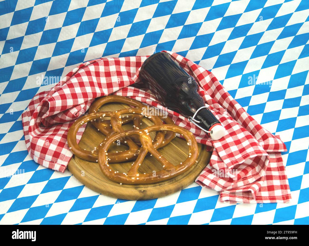 Bavarian pretzel, beer bottle, Oktoberfest in Munich, Germany, Bavaria, Muenchen Stock Photo