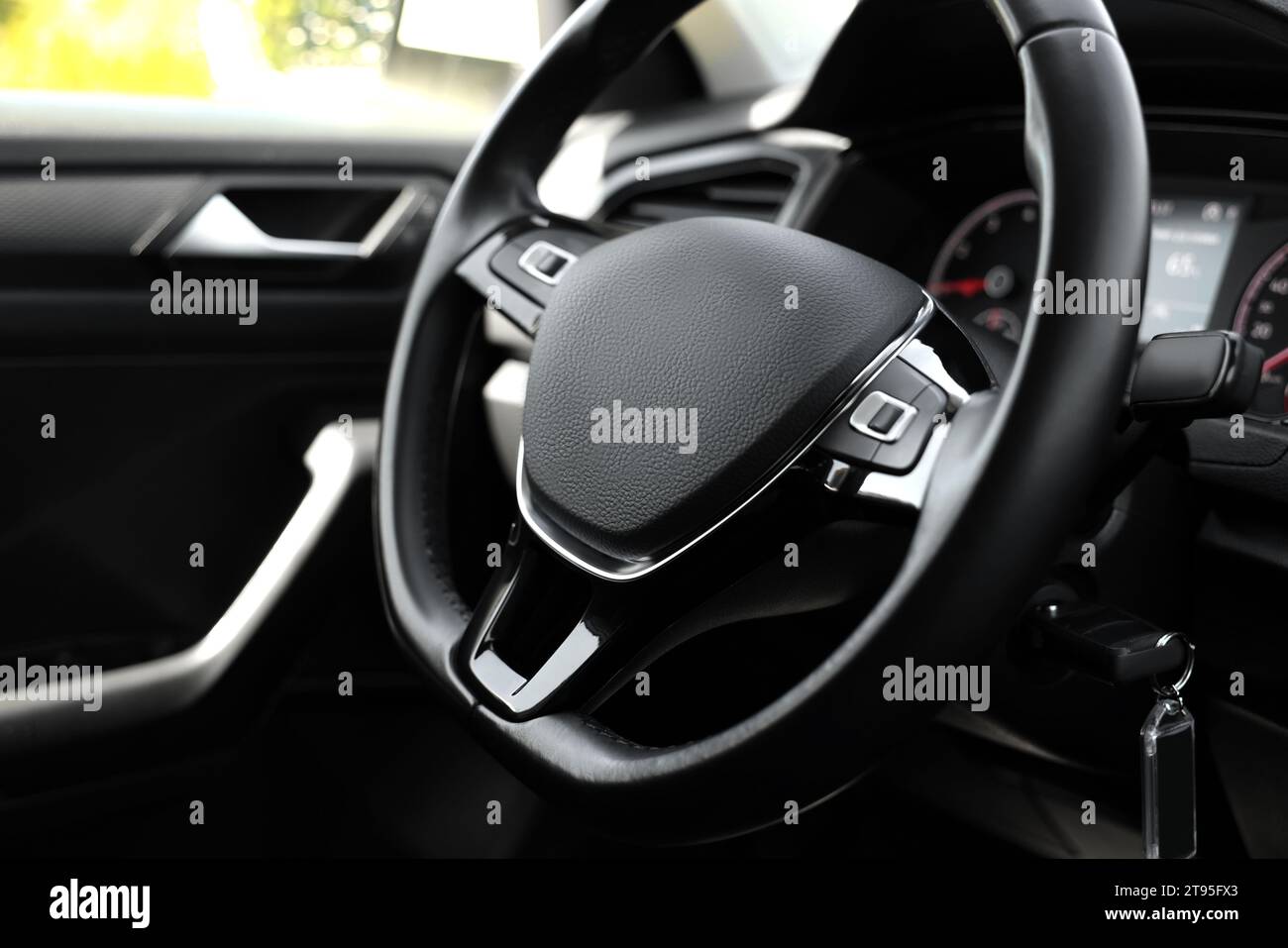 Safety airbag sign on steering wheel inside car Stock Photo