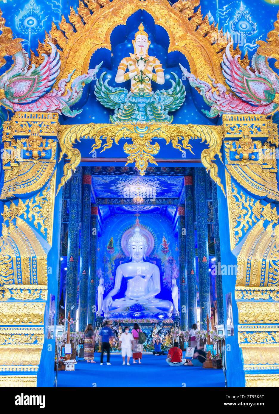 Chiang Rai,NorthThailand-March 26 2023:The ornate golden door frame of The Blue Temple,leads into the interior,decorated with intricate designs,blue h Stock Photo