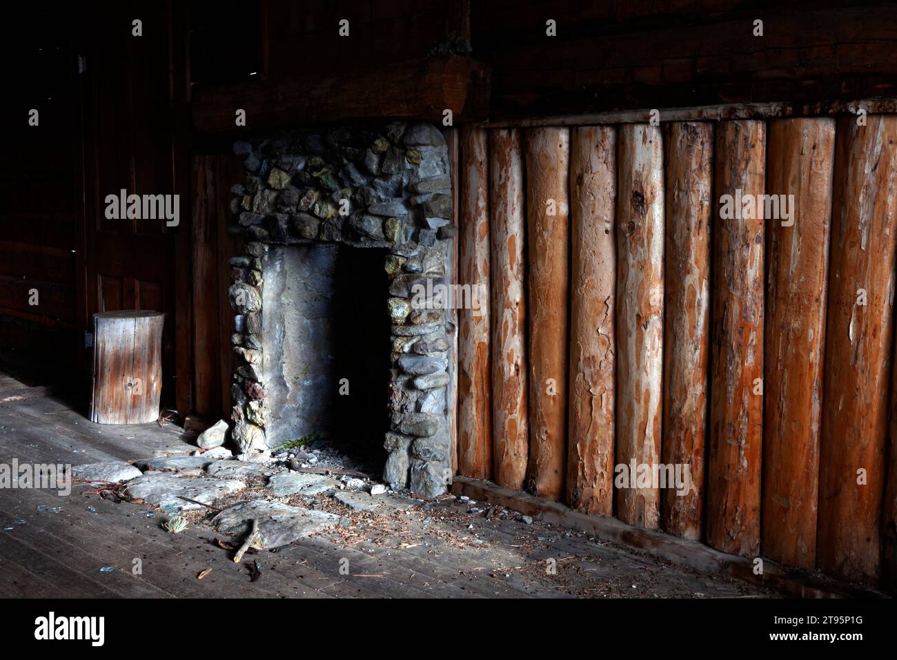 Fireplace and threshold in a guest cabin at the Double D Ranch near the mining ghost town of Kirwin. Double D Ranch is in the Shoshone National Forest Stock Photo