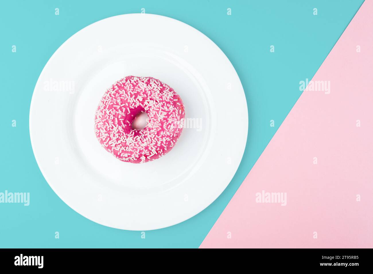 Pink donut on color background Stock Photo
