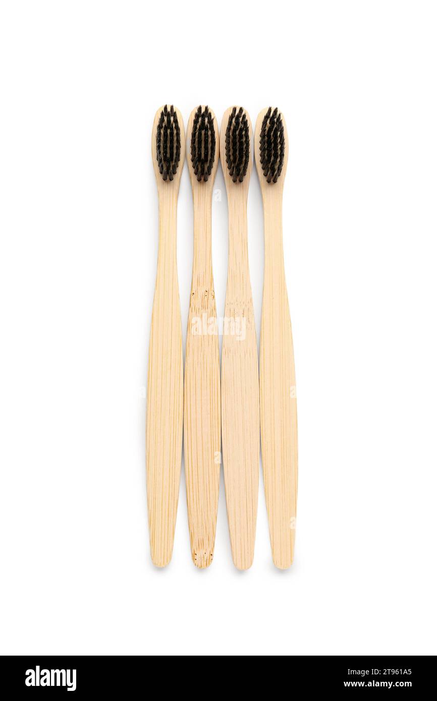 Many bamboo toothbrushes on white background Stock Photo - Alamy