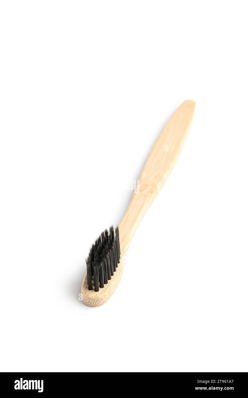 Bamboo toothbrush on white background Stock Photo - Alamy