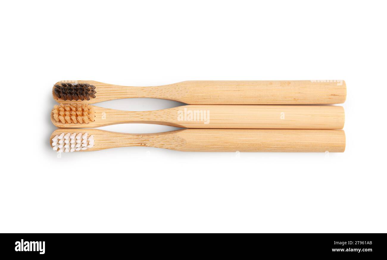 Bamboo tooth brushes on white background Stock Photo - Alamy