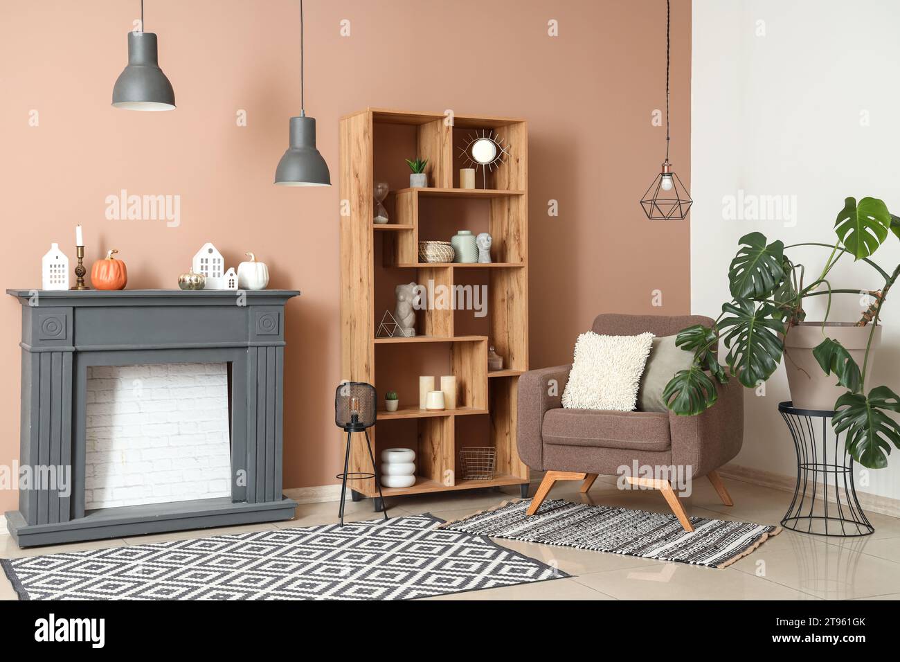 Interior of modern living room with fireplace, shelving unit and ...