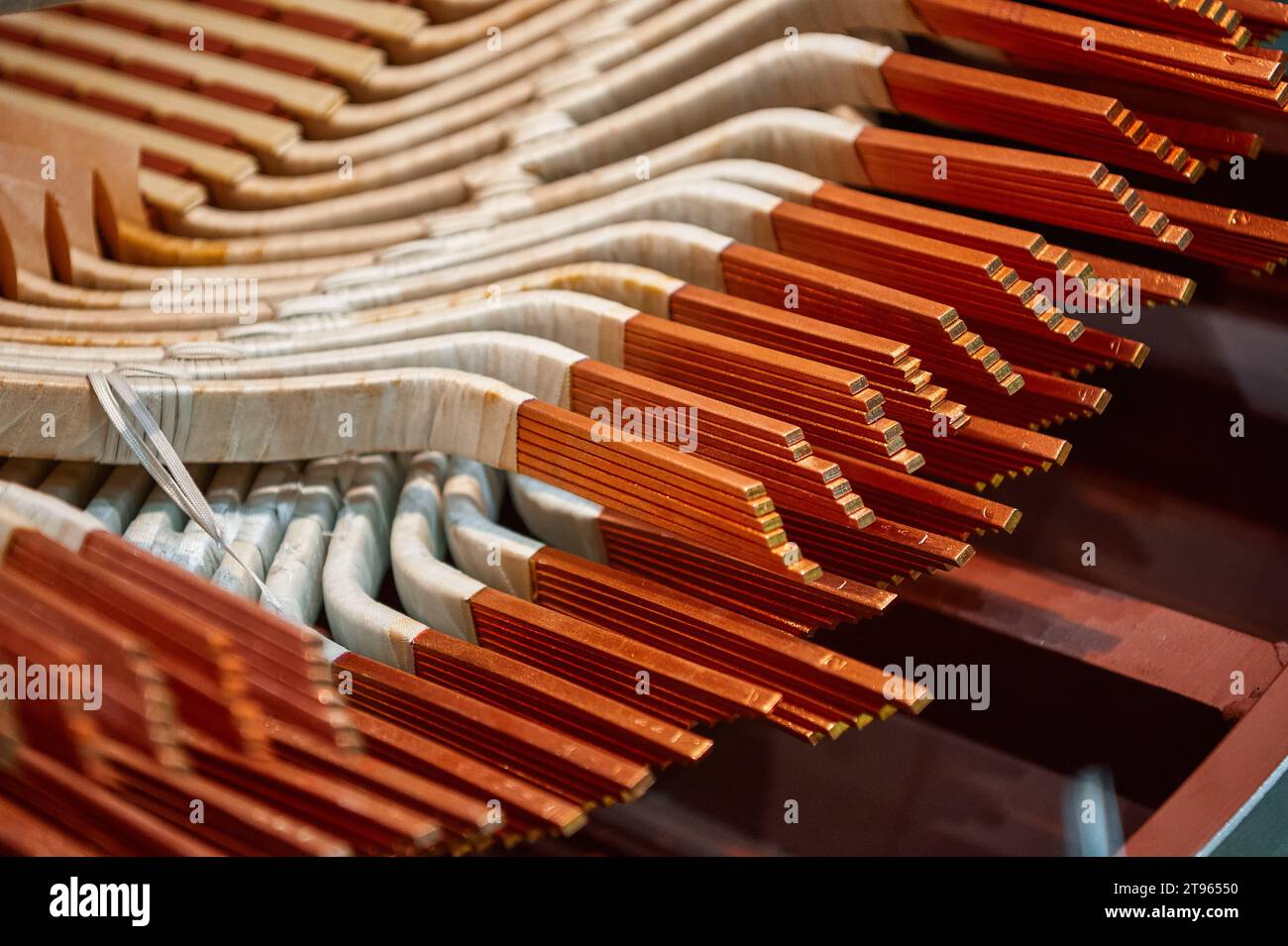 The stator of an industrial electric motor at the assembly stage. Thick ...