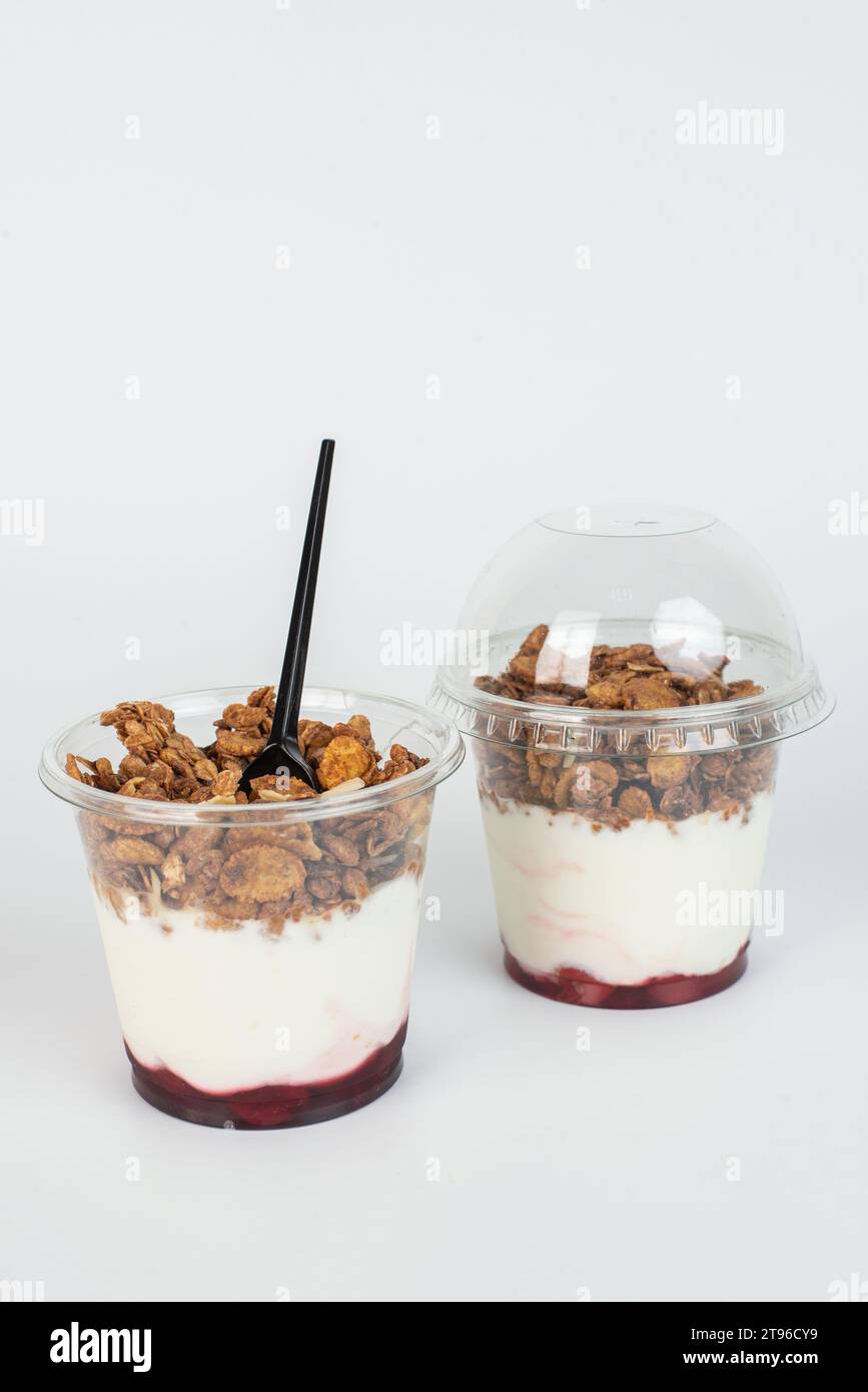 Complete meal contained in this cup of yogurt, blueberries, strawberries, and granola for plenty