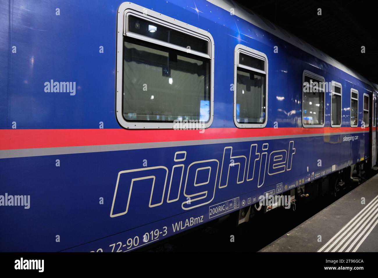 A nightjet sleeper train on platform of station.  Zurich, Switzerland. Stock Photo